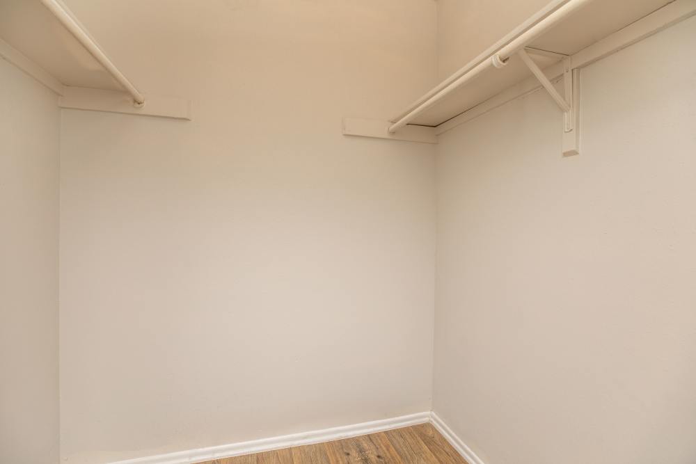 Walk-in closet at Fredericksburg Place Apartments in San Antonio, Texas