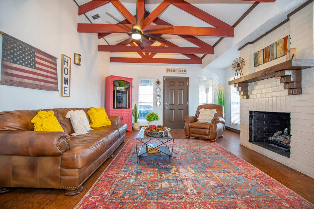 Lounge with carpet flooring at Fredericksburg Place Apartments in San Antonio, Texas