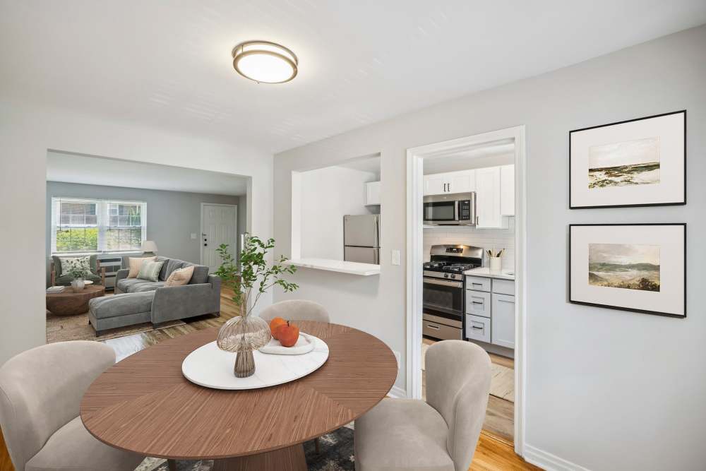 Dining room and kitchen area in Eagle Rock Apartments at Maplewood in Maplewood, New Jersey