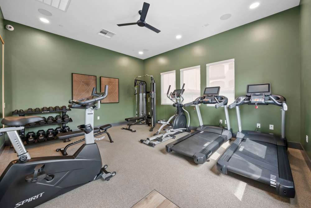 Cardio equipment in the fitness center at Canyon Bluffs Apartment Homes in Riverside, California