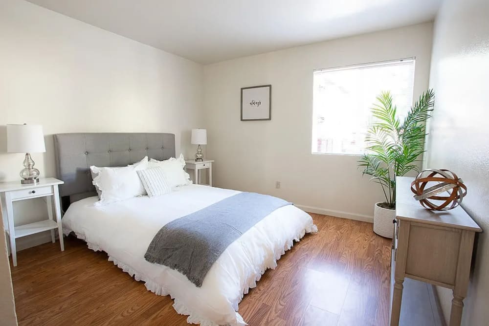 Cozy bedroom at Walnut Apartments in Santa Rosa, California