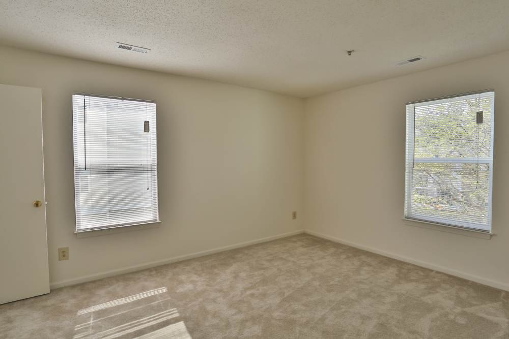 Unfurnished bedroom with carpet flooring at Chickahominy Bluff in Mechanicsville,Virginia