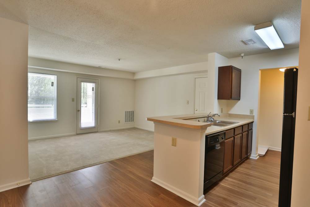 Kitchen with a black colored dishwasher and a breakfast counter at Chickahominy Bluff in Mechanicsville,Virginia