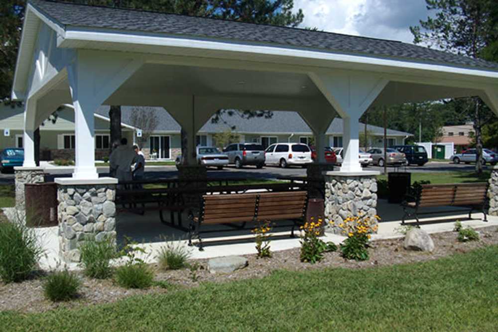 Community outside seating area at Rolling Brook Apartments in Algonac, Michigan