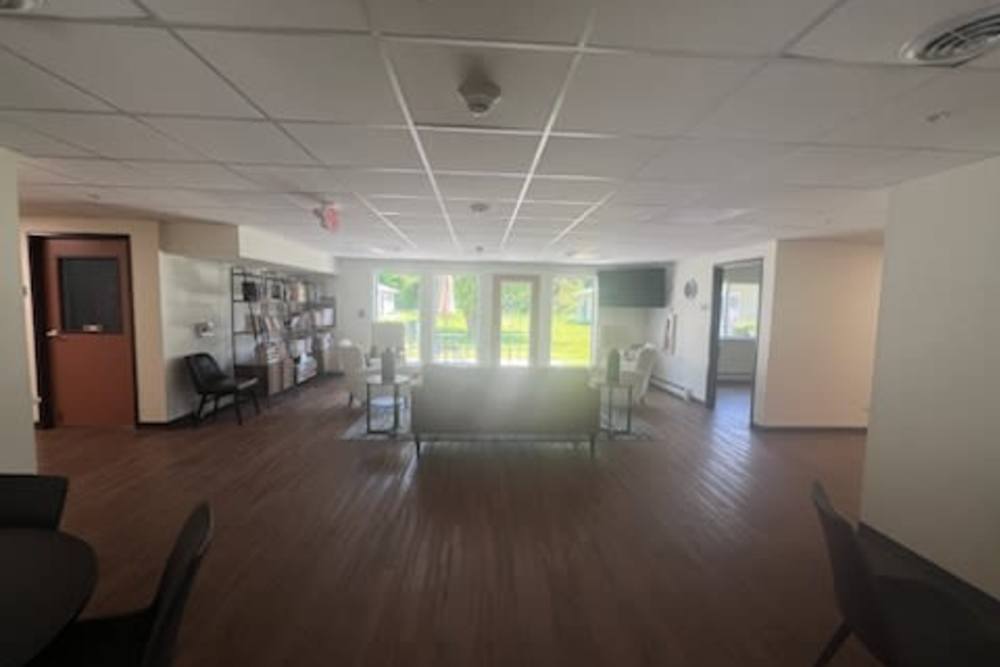 Clubhouse with wooden flooring at Rolling Brook Apartments in Algonac, Michigan 