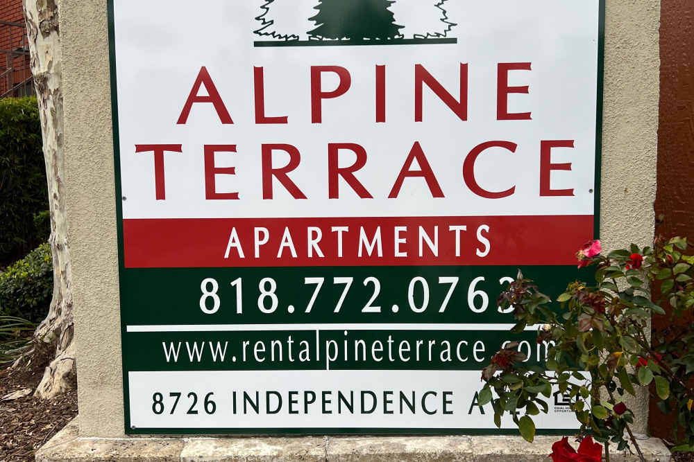 Front Signage at Alpine Terrace Apartments in Canoga Park, California