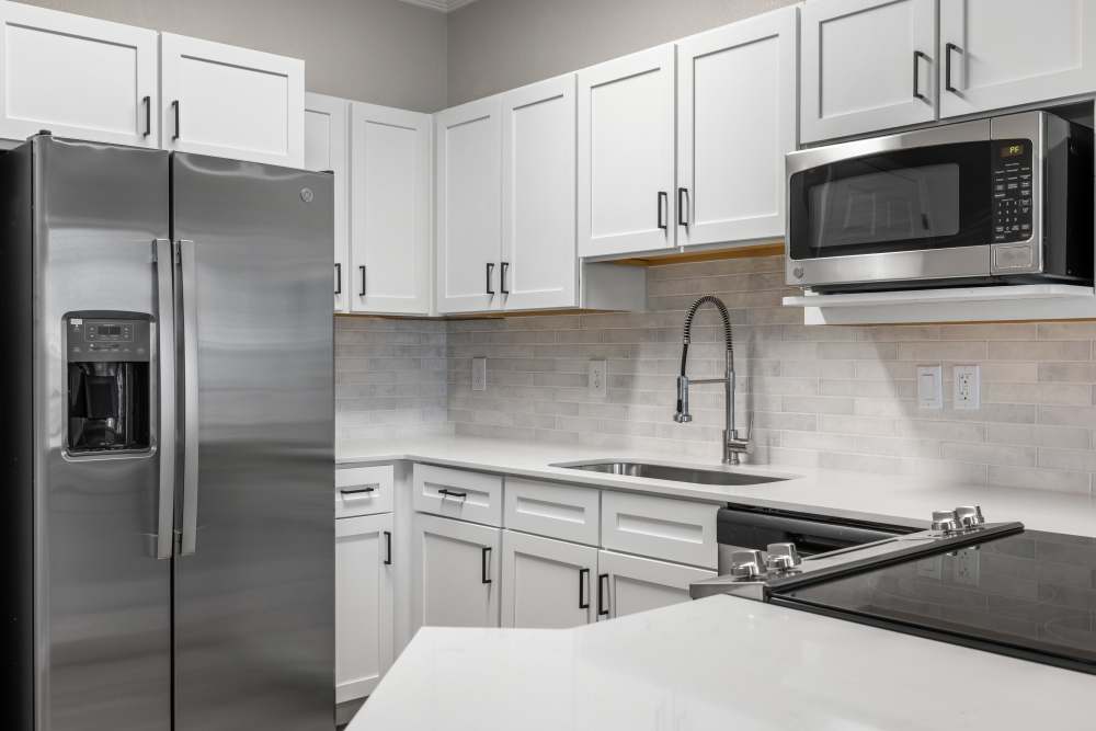 Newly Renovated Kitchen and Huge Breakfast bar at Briargate on Main in Parker, Colorado