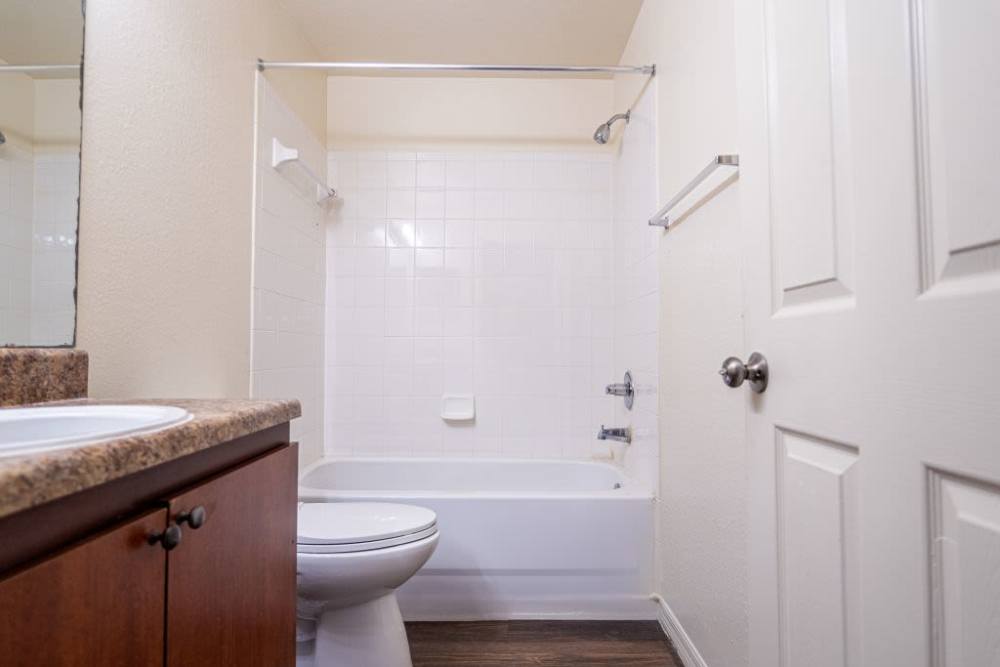 Bright bathroom with shower and tub at Clarcona Groves in Orlando, Florida,