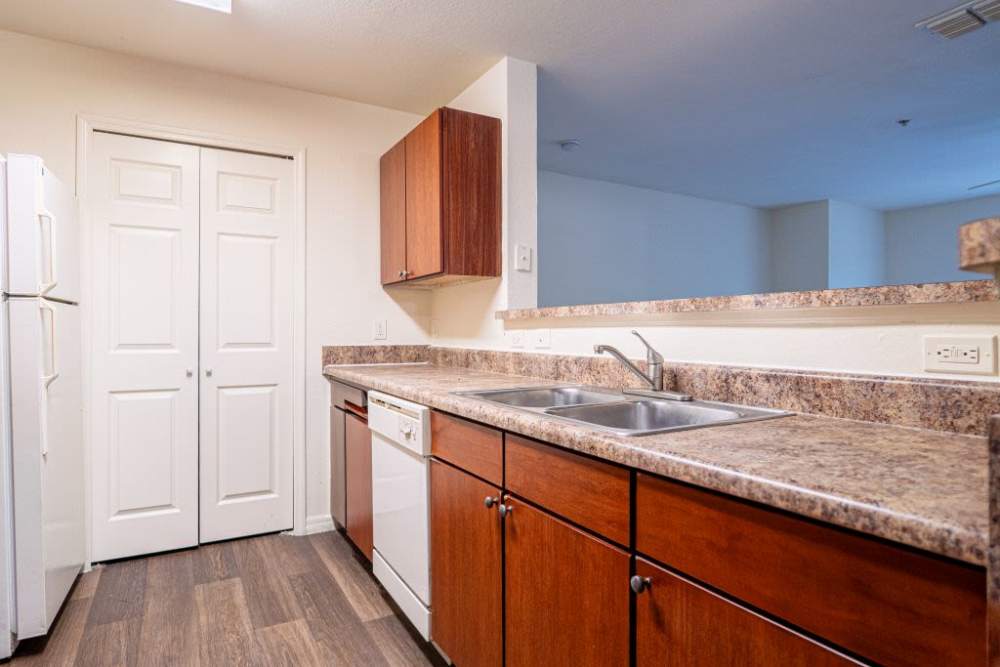 Spacious island kitchen with granite countertops at Clarcona Groves in Orlando, Florida,