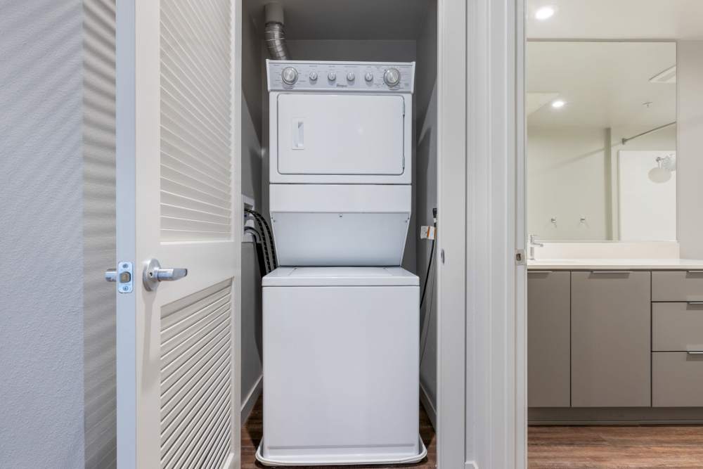 Stacked washer and dryer at The George Apartment Homes in Anaheim, California