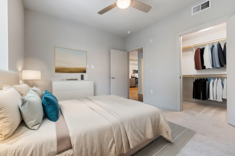 Bedroom with ceiling fan at The George Apartment Homes in Anaheim, California