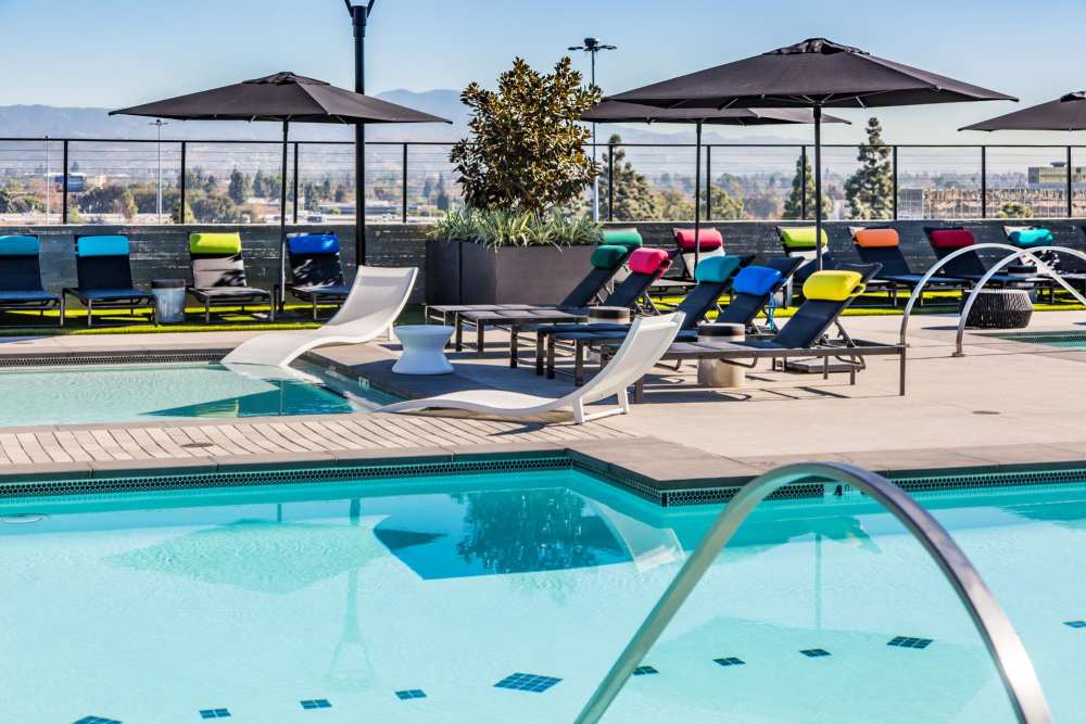 Resort-style swimming pool at The George Apartment Homes in Anaheim, California