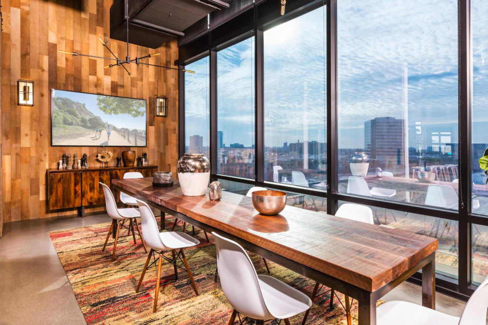 Indoor meeting table at The George Apartment Homes in Anaheim, California