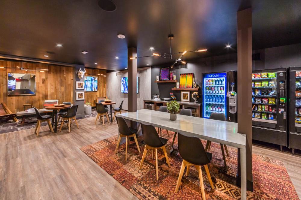 Resident lounge with vending machines at The George Apartment Homes in Anaheim, California