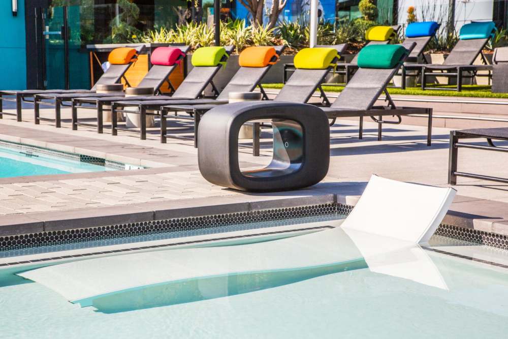 In-pool loungers at The George Apartment Homes in Anaheim, California