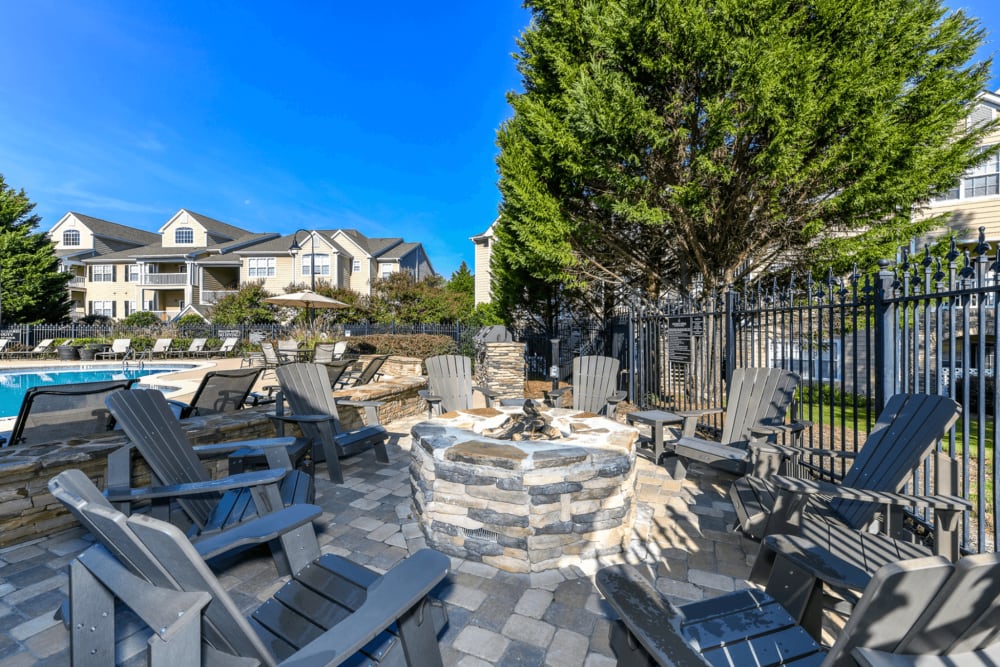 Outdoor fire pit area with lounge seating at Walden Creek in Greenville, South Carolina
