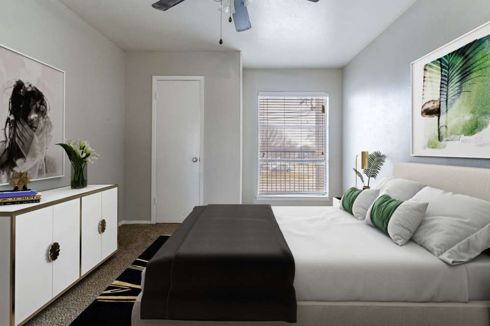 Beautiful bed at Tribecca Pointe Apartments in Hurst, Texas