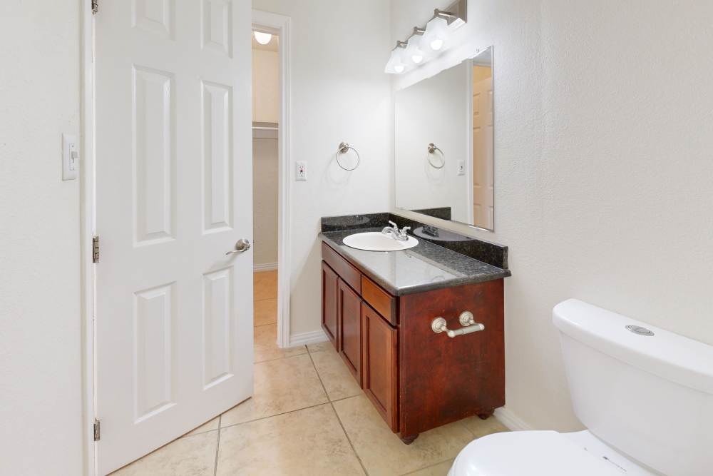 Open kitchen with air-conditioning at Tucasa Townhomes in Irving, Texas,