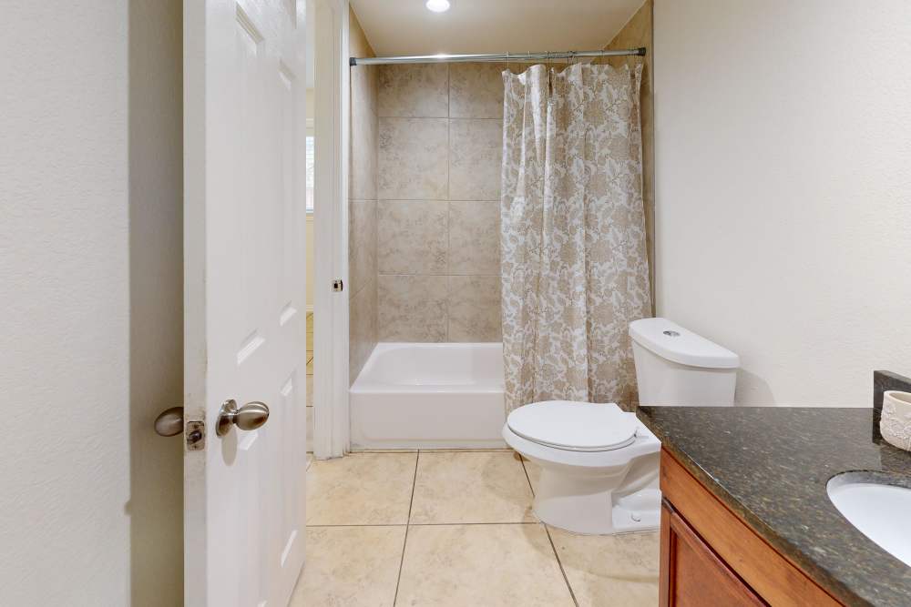 Toilet at Tucasa Townhomes in Irving, Texas
