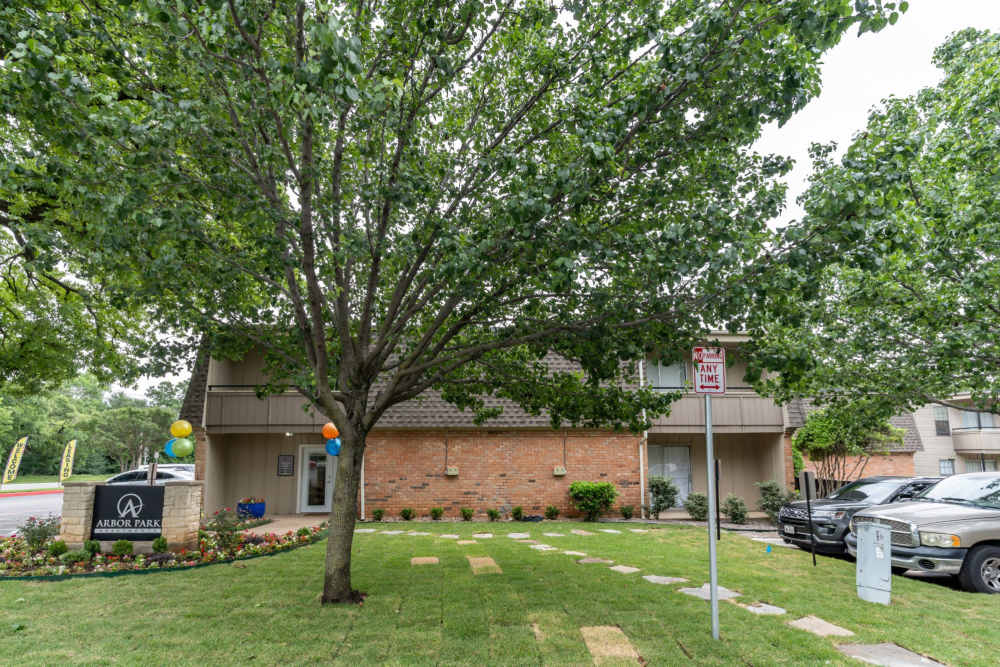 Community surrounded by greenery at Arbor Park Apartments in Hurst, Texas