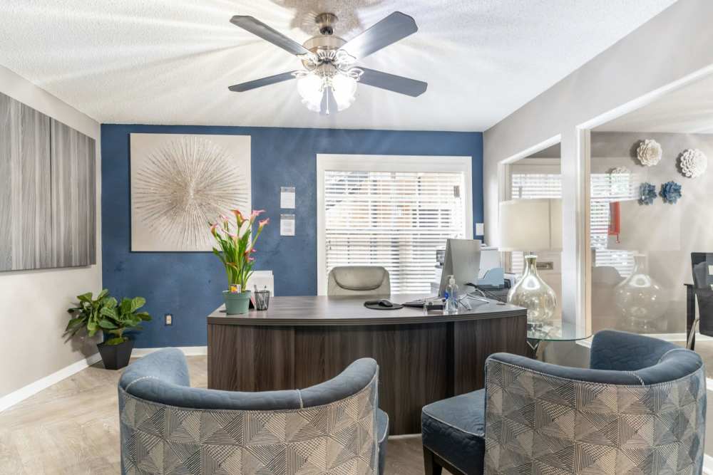 Spacious bedroom with a fan at Arbor Park Apartments in Hurst, Texas