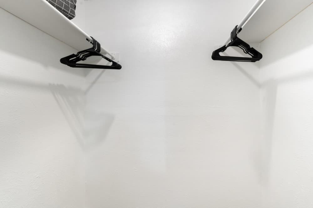 Closet hangers at Arbor Park Apartments in Hurst, Texas
