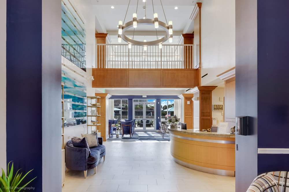 Elegant apartment entryway with secure access and stylish decor at The Meridian at Waterways in Fort Lauderdale, FL