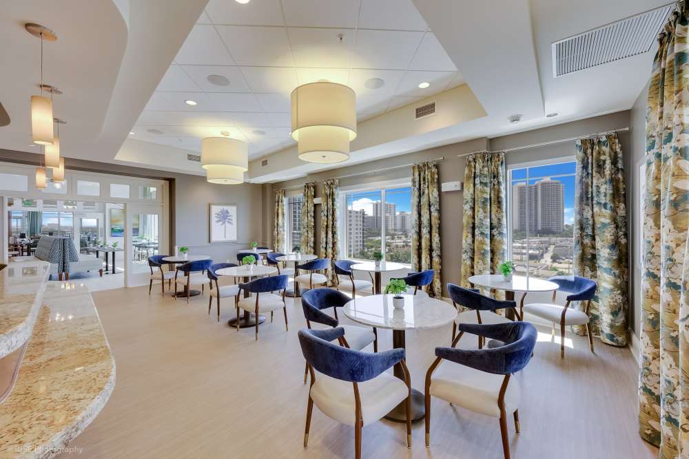 Spacious lobby featuring lounge seating and decorative accents at The Meridian at Waterways in Fort Lauderdale, FL