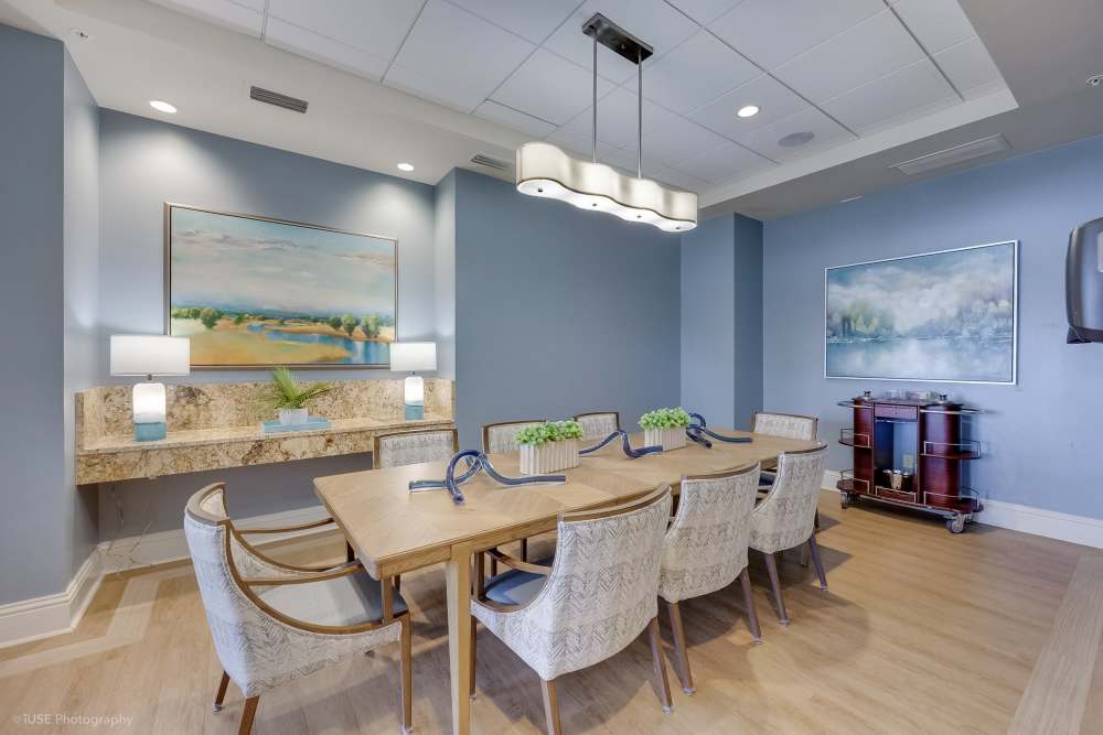 Bright coworking area with desks and ergonomic chairs at The Meridian at Waterways in Fort Lauderdale, FL