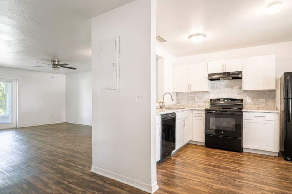 View of the kitchen and the living room at Cypress Commons in Wildwood, Florida