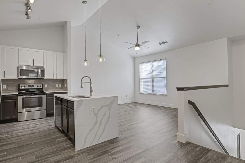 Kitchen with island at Ashwood in Pflugerville, Texas