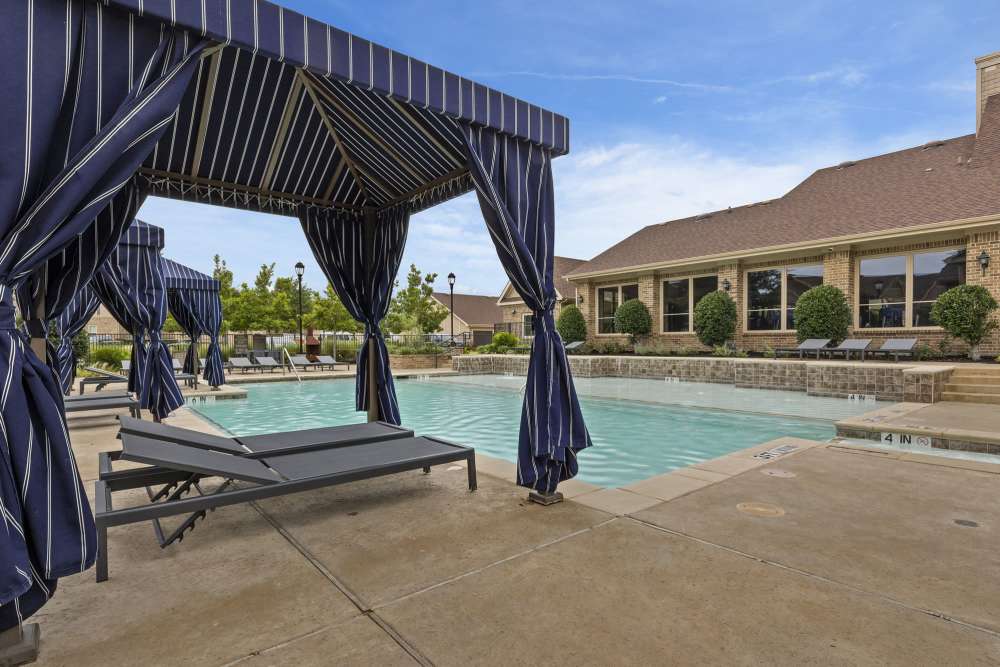 Lounge chair near pool at Ashwood in Pflugerville, Texas