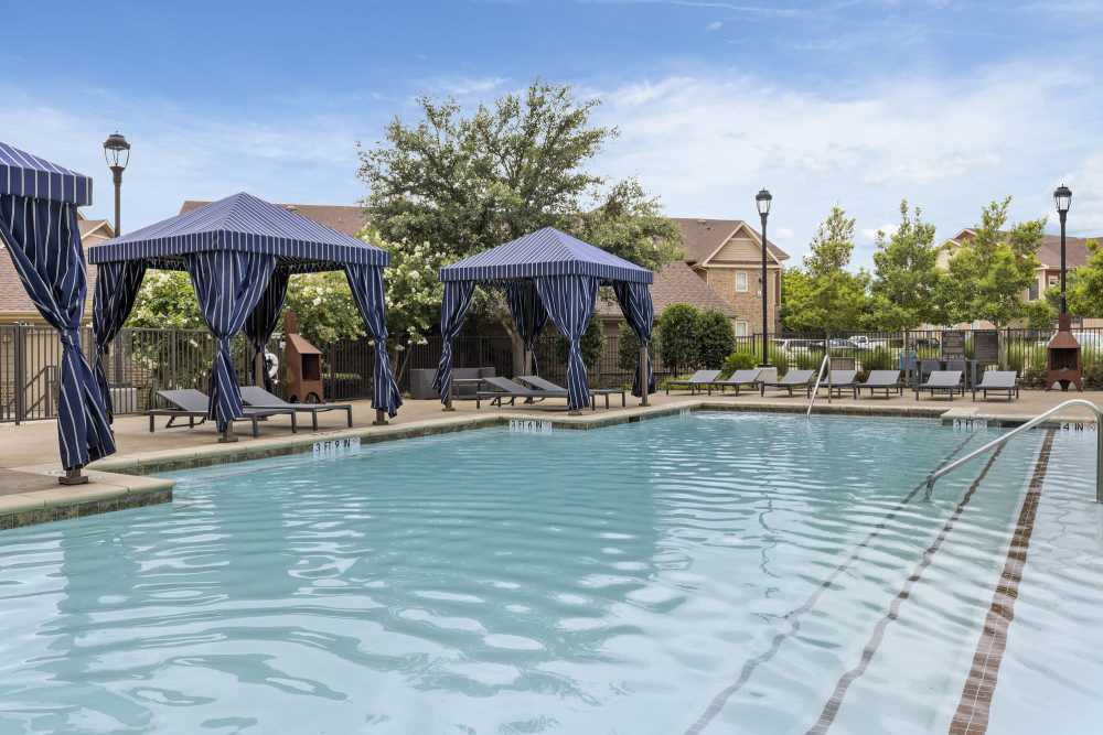 Pool with view to cabanas at Ashwood in Pflugerville, Texas