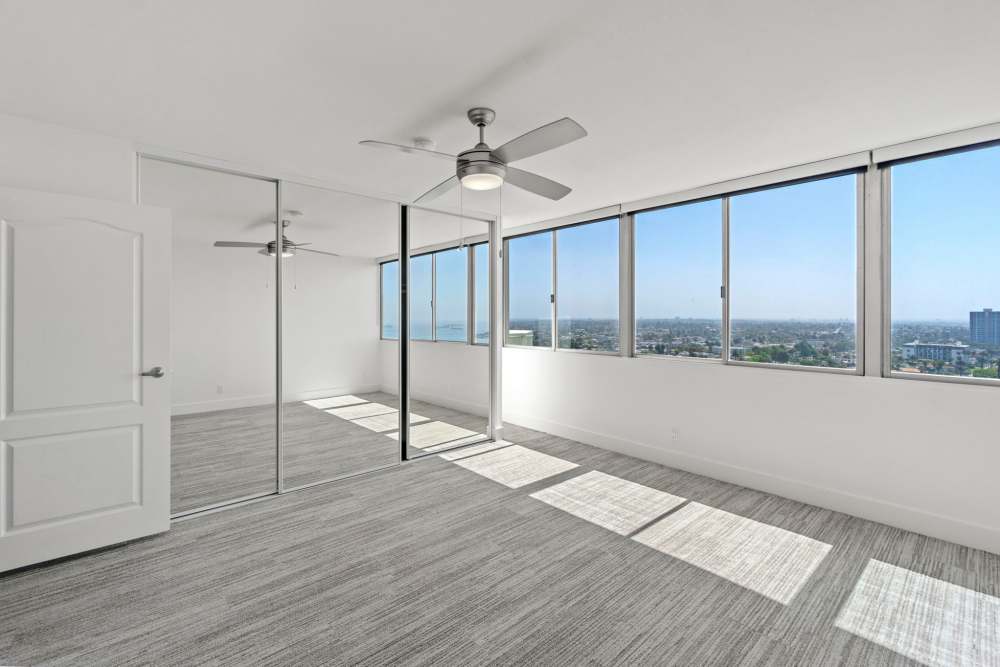 Kitchen with all latest appliances including refrigerator and microwave at 1900 Ocean Apartment Homes in Long Beach,California