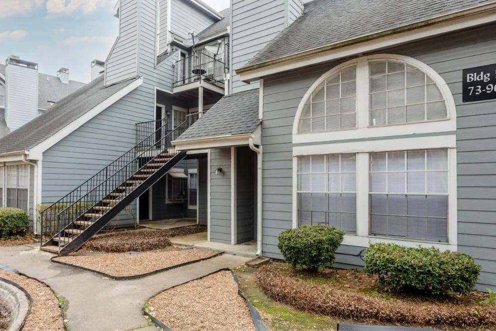Exterior view of the apartment building at Pine Lake Village in Houston, Texas