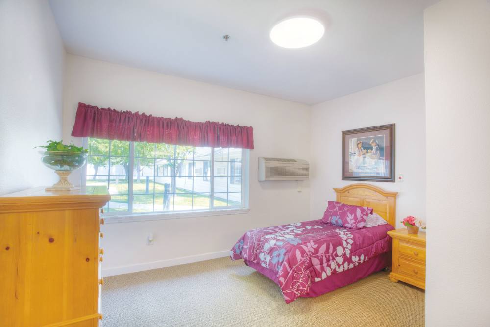 Resident bedroom at Eagle Springs Memory Care in College Place, Washington
