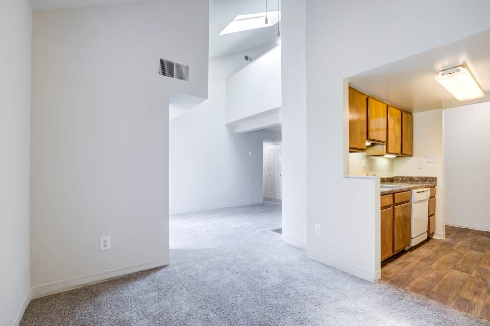 Living room adjacent to kitchen at Preserve at Cradlerock Apartment Homes in Columbia, Maryland