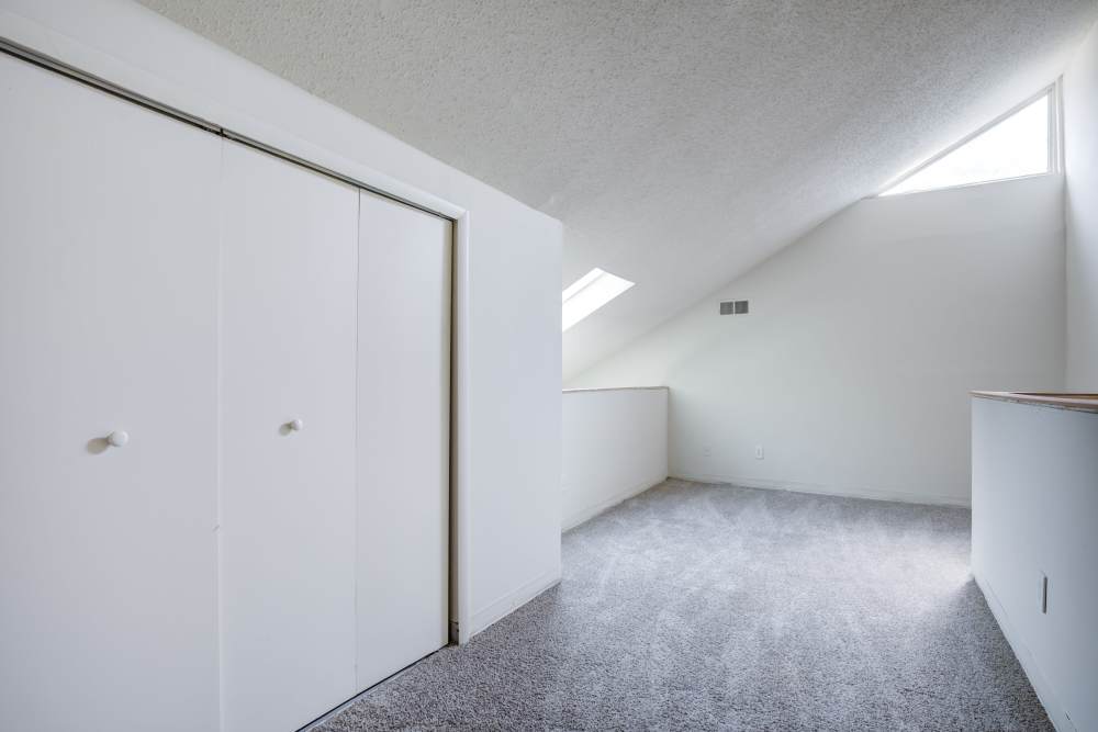 Bedroom with built-in cabinet at Preserve at Cradlerock Apartment Homes in Columbia, Maryland