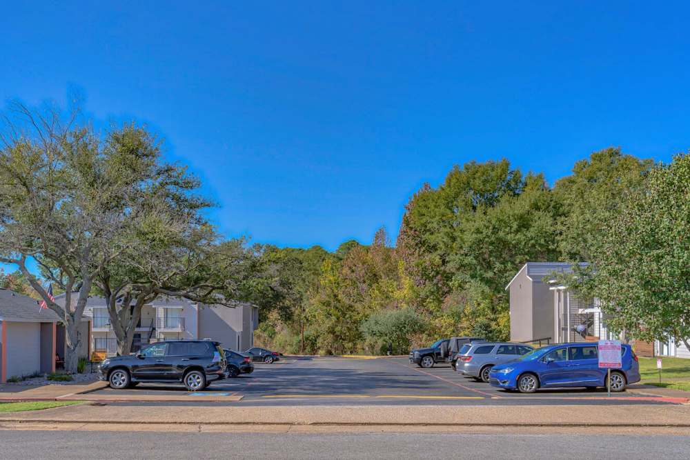 On-site parking area at Oak Manor Apartments in Henderson, Texas