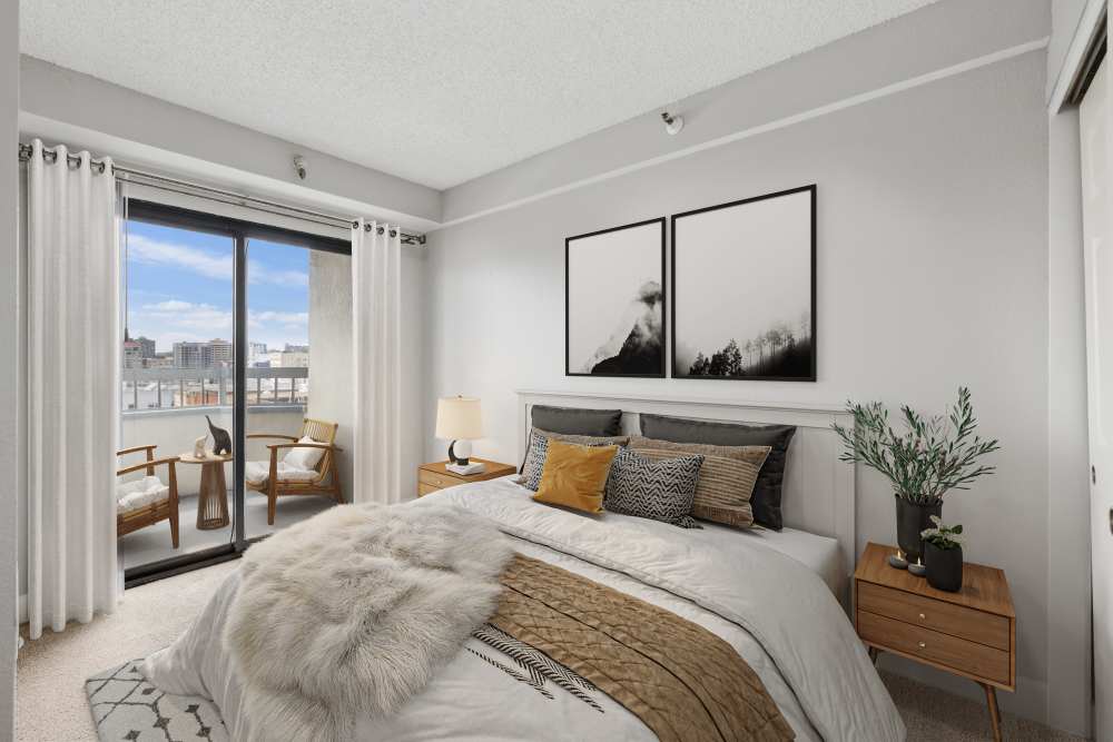 Spacious bedroom with a patio and View Of The City at Tower 737 Condominium Rentals in San Francisco, California