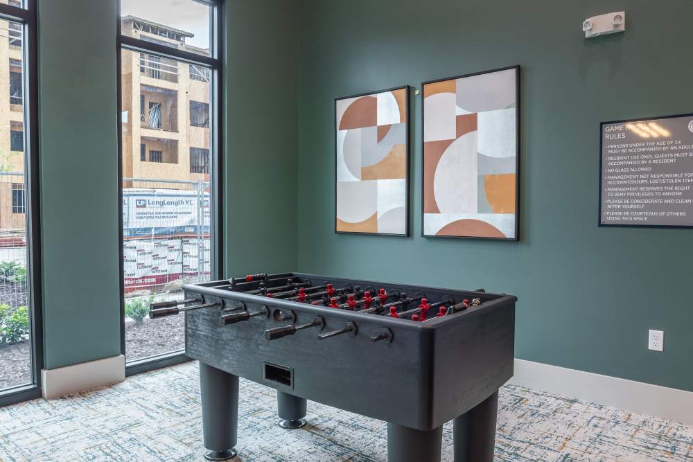 Foosball Table with Large windows in Game Room at The Waters at Freeport in Freeport, Florida
