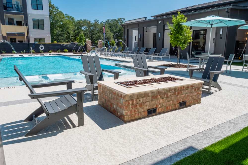 Resort-Style Swimming Pool with Fireplace at The Waters at Freeport in Freeport, Florida