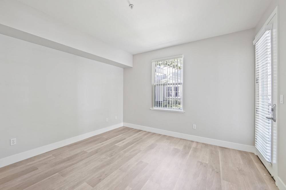 bedroom with window at The Kensington in Pleasanton, California