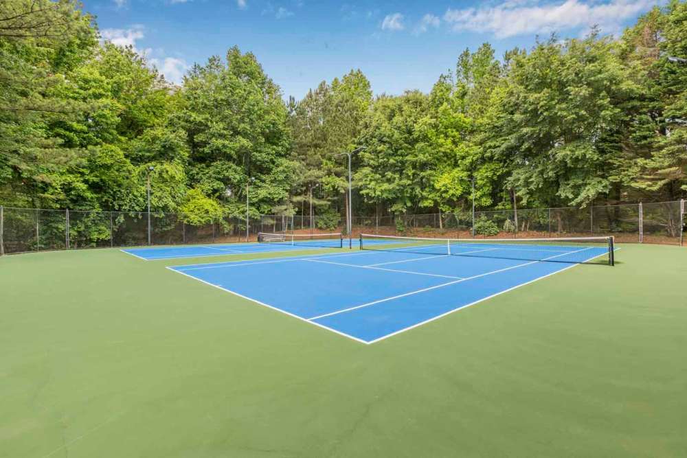 An on-site tennis court at Retreat at Johns Creek in Duluth, Georgia