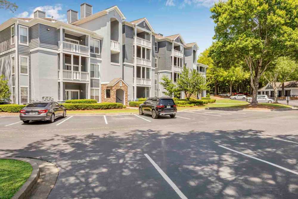 A paved walkway to an apartment building at Retreat at Johns Creek in Duluth, Georgia