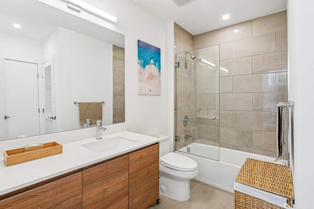 Bathroom with white vanity unit at Fifteen in Miami,Florida