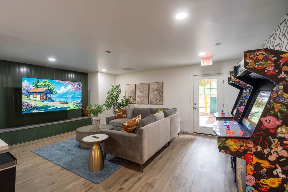 Community Lounge with games free wifi and chef's kitchen at The Theodore in Tacoma, Washington