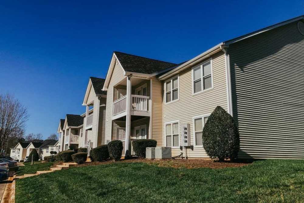 Exterior of the property with a beautiful lawn at Orchard Trace Gastonia in Gastonia,North Carolina