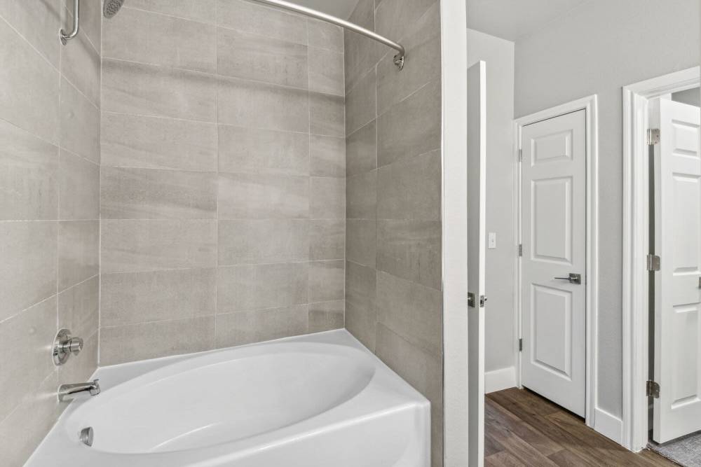Bright bathroom with tub at Costa Bella in San Antonio, Texas