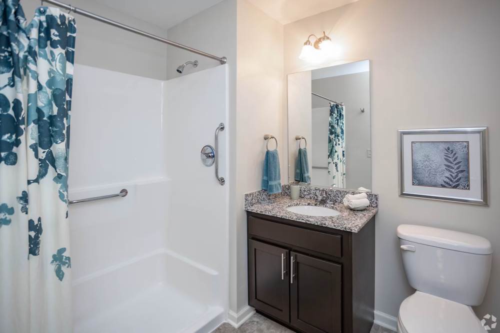Bathroom with shower at Fox Creek Estates in East Amherst, New York
